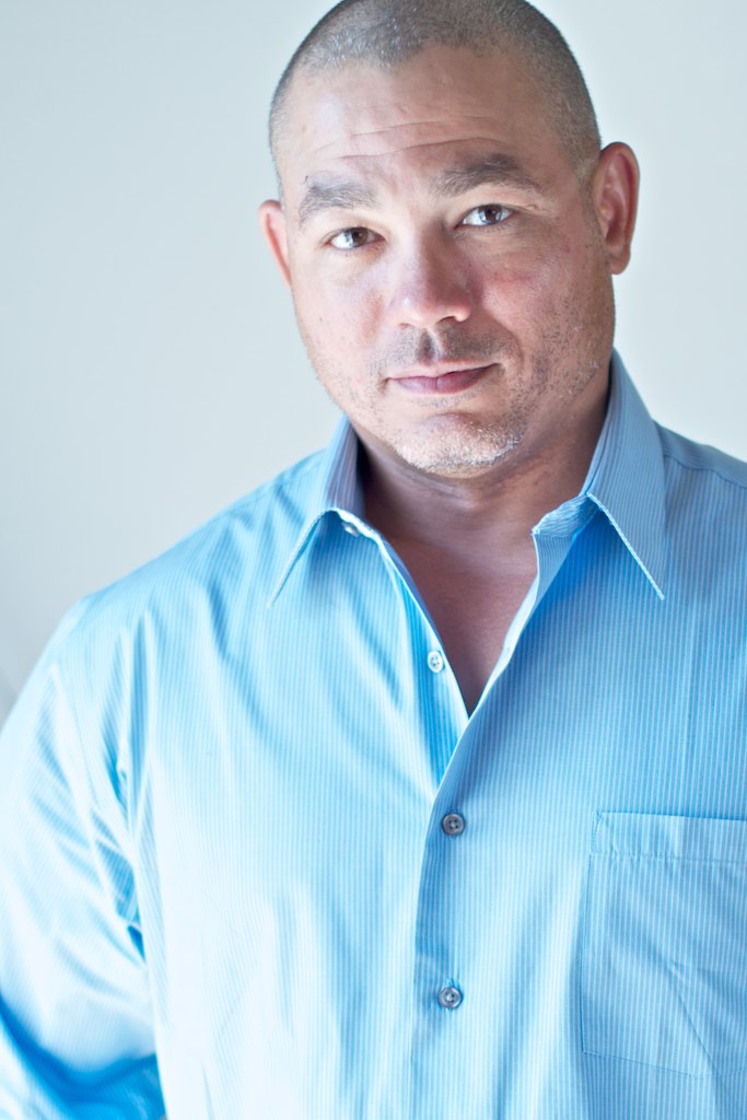 Portrait of Devin Lockett in a light blue shirt